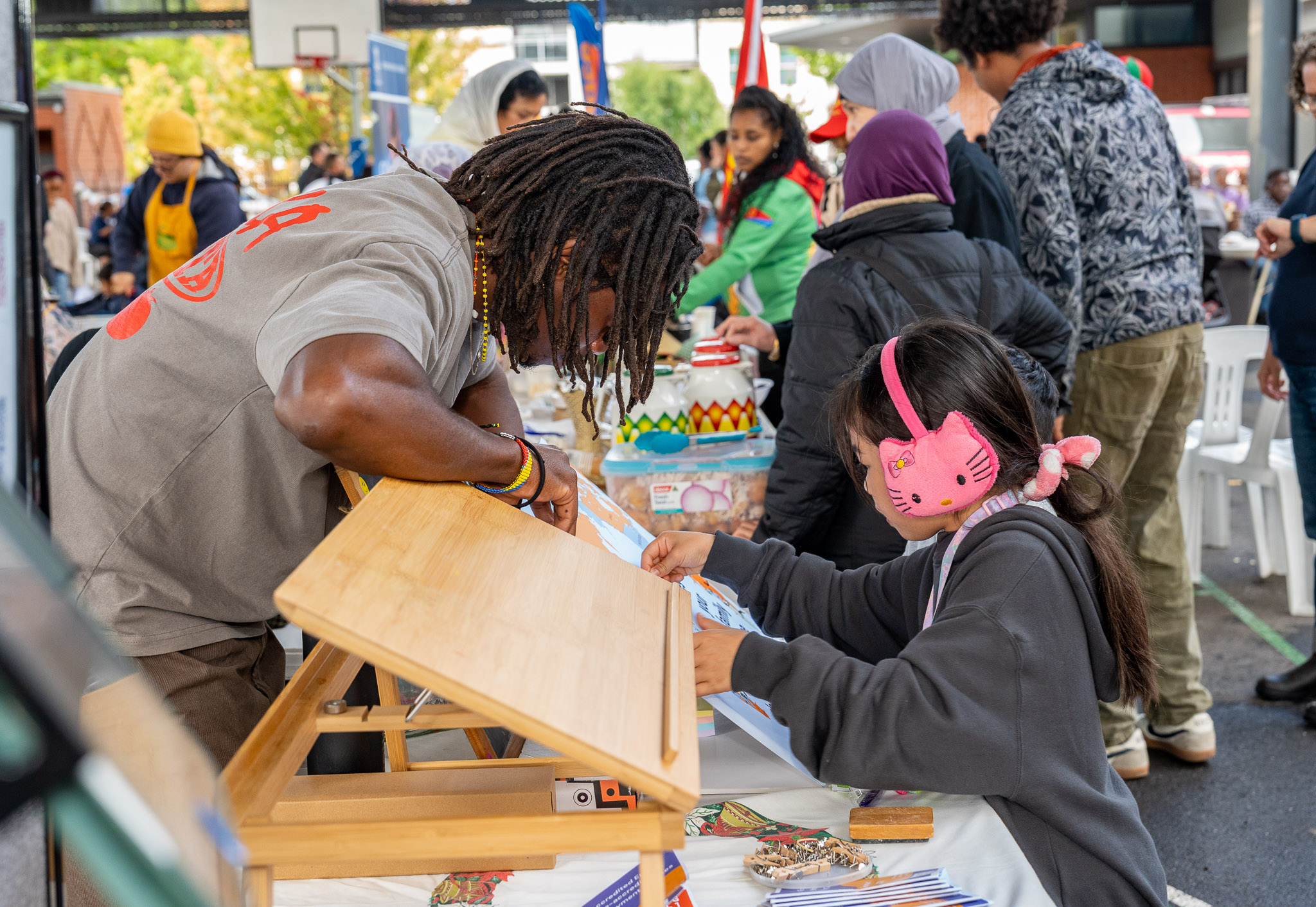 Young children moved between activities led by students, staff and volunteers, taking part in activities that celebrated cultural diversity and wellbeing. Picture: David Darlington