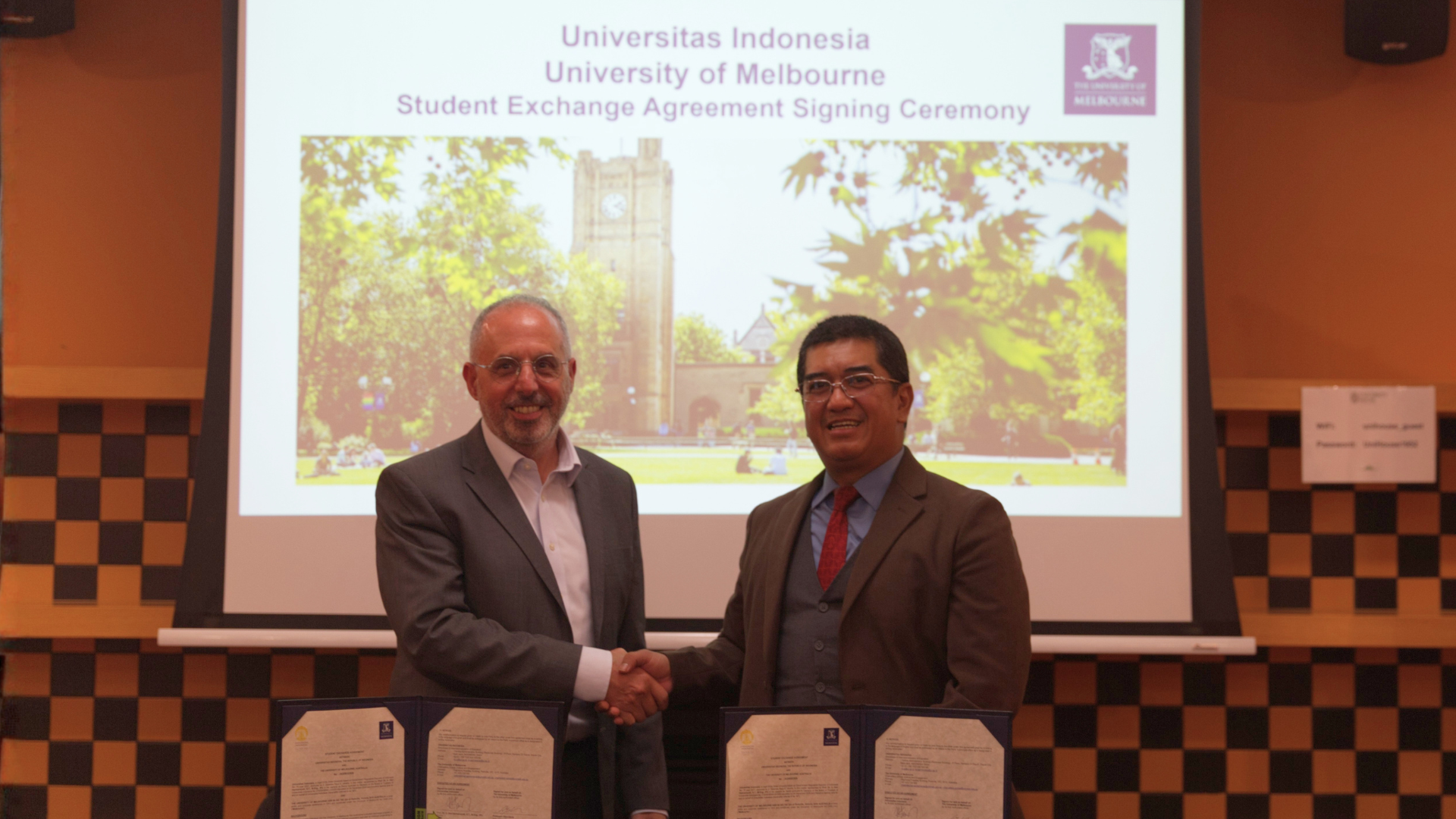 University of Melbourne Pro Vice-Chancellor (Global) Professor Frank Vetere and Universitas Indonesia Rector Professor Heri Hermansyah celebrating a new exchange agreement. Picture: University of Melbourne