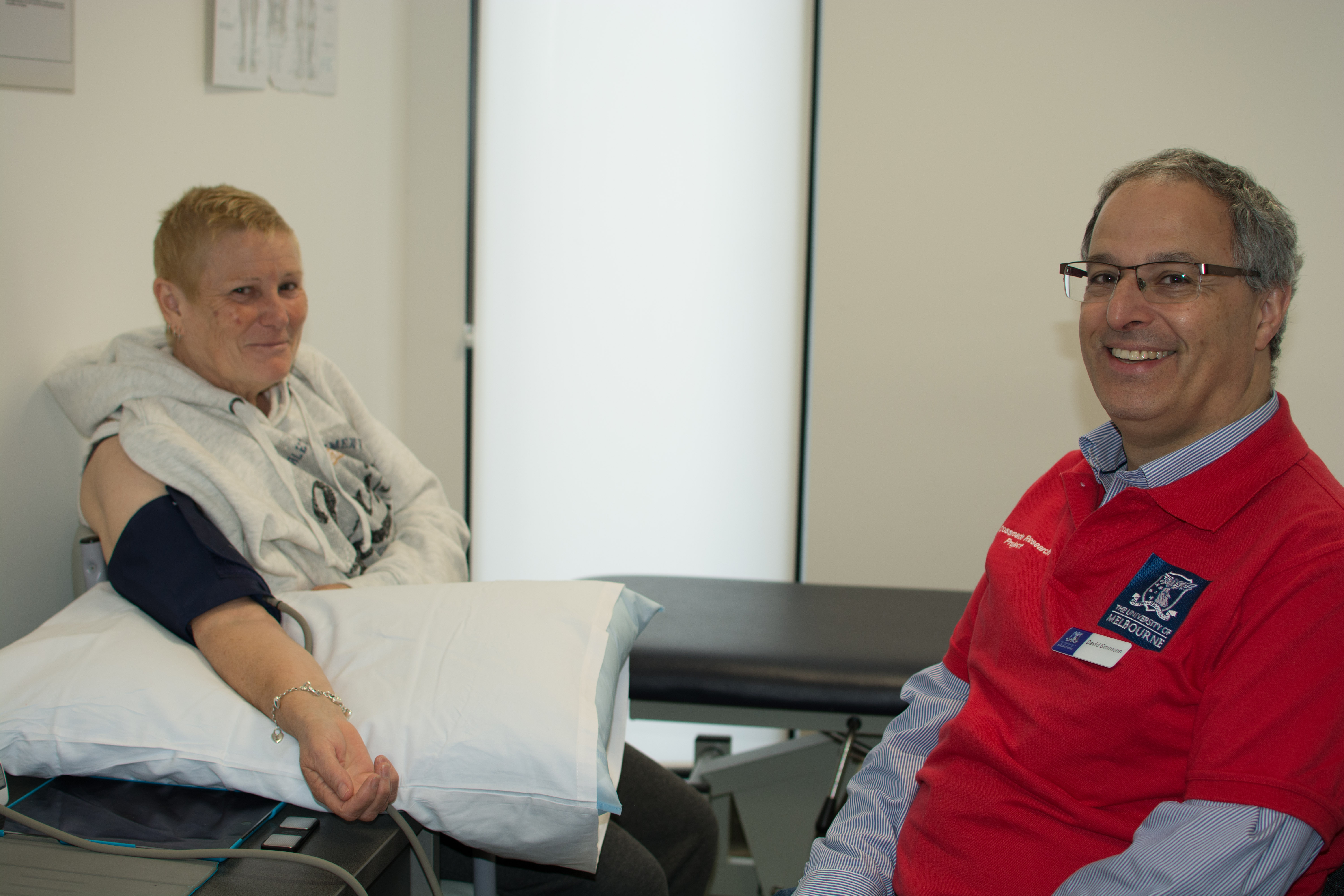 Seymour resident having her blood pressure checked by a University of Melbourne staff member in the Crossroads clinic