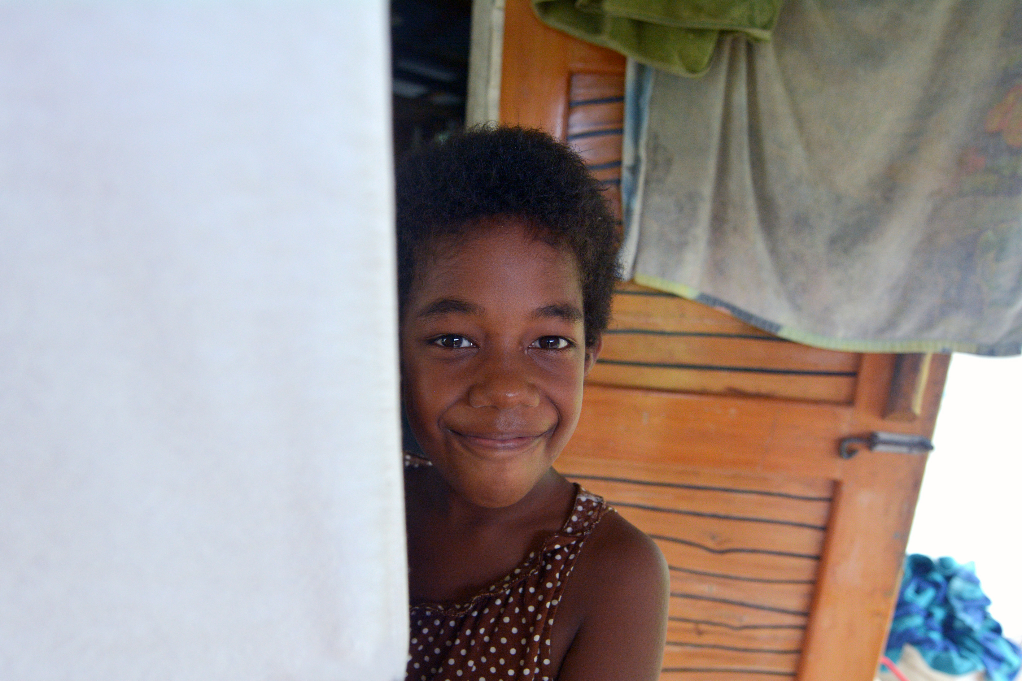 Fijian Girl (age 8) looks at the camera and smile