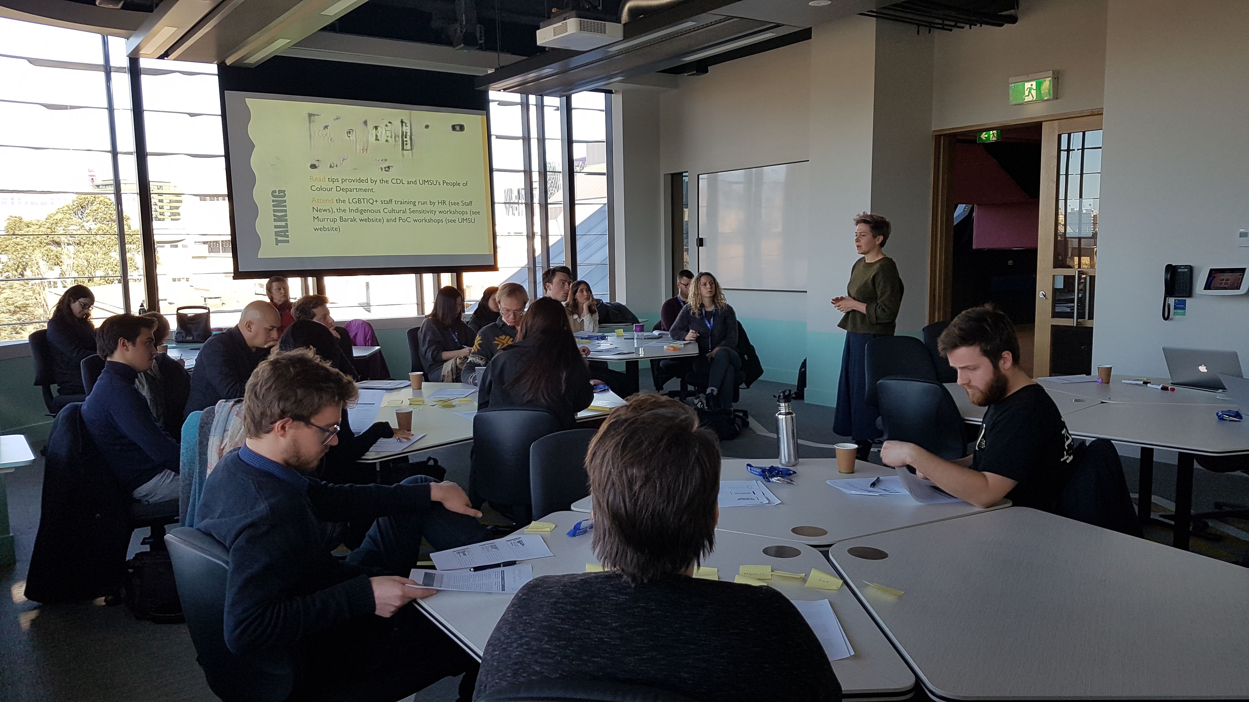 Image of Kay Are, Lecturer and Curriculum Designer in the Faculty of Arts, teaching a classroom full of students