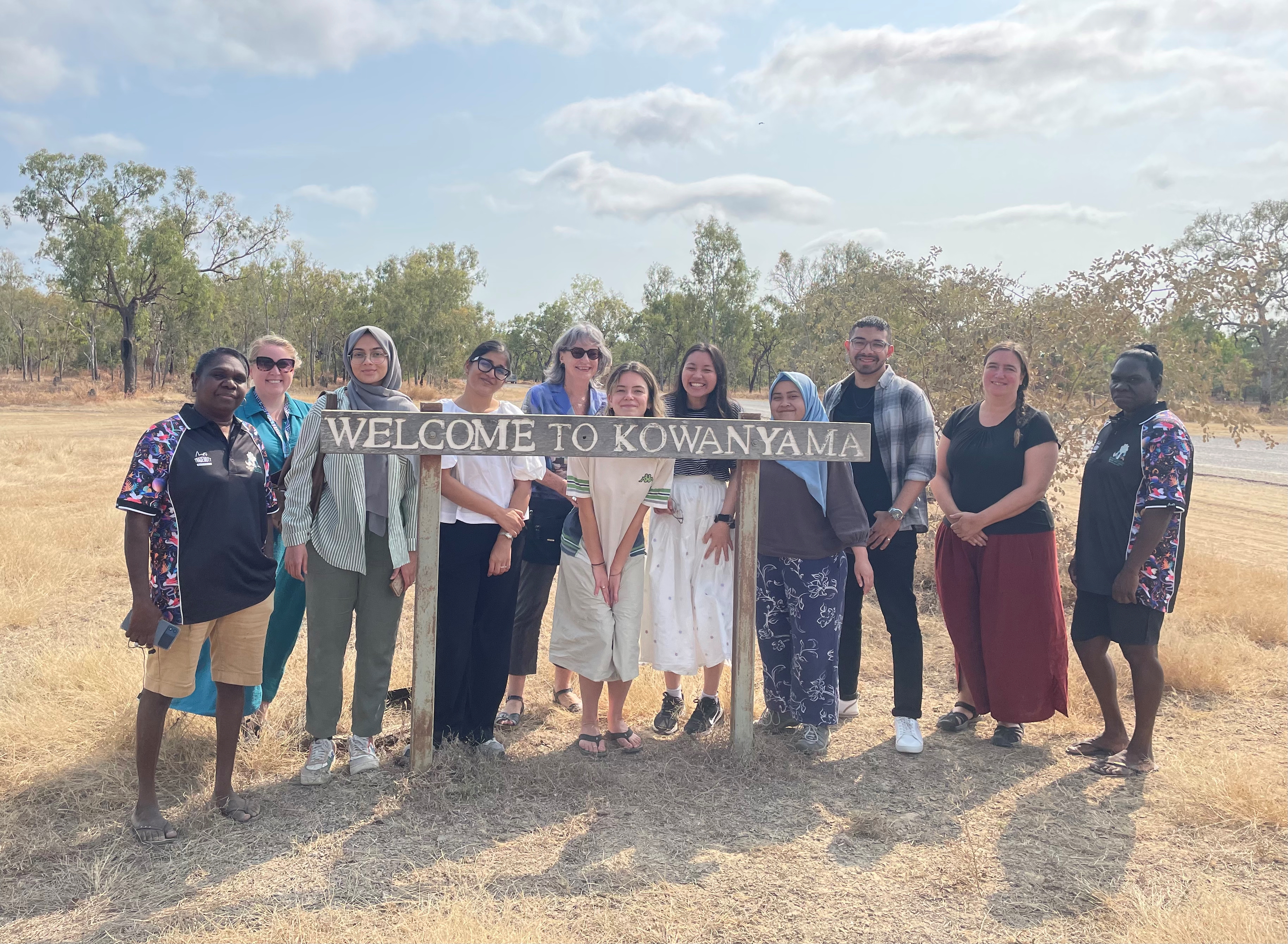 Research team with YETI and community members at the Kowanyama Sign. Picture: YETI