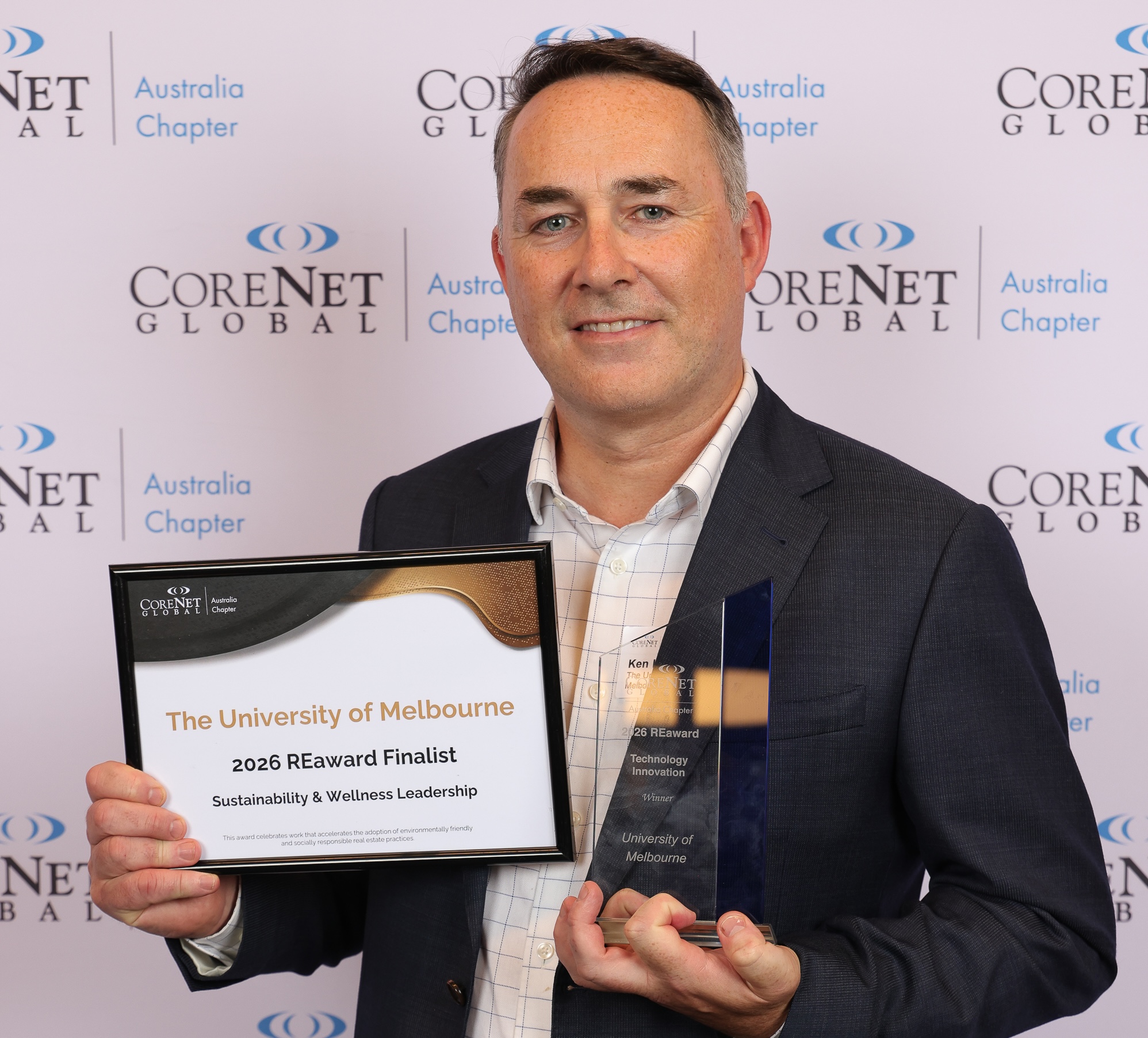 Ken Lynch, Director, Campus Operations and Delivery, accepts the 2026 Technology Innovation Award at the 2026 CoreNet Global Australia Chapter REawards.