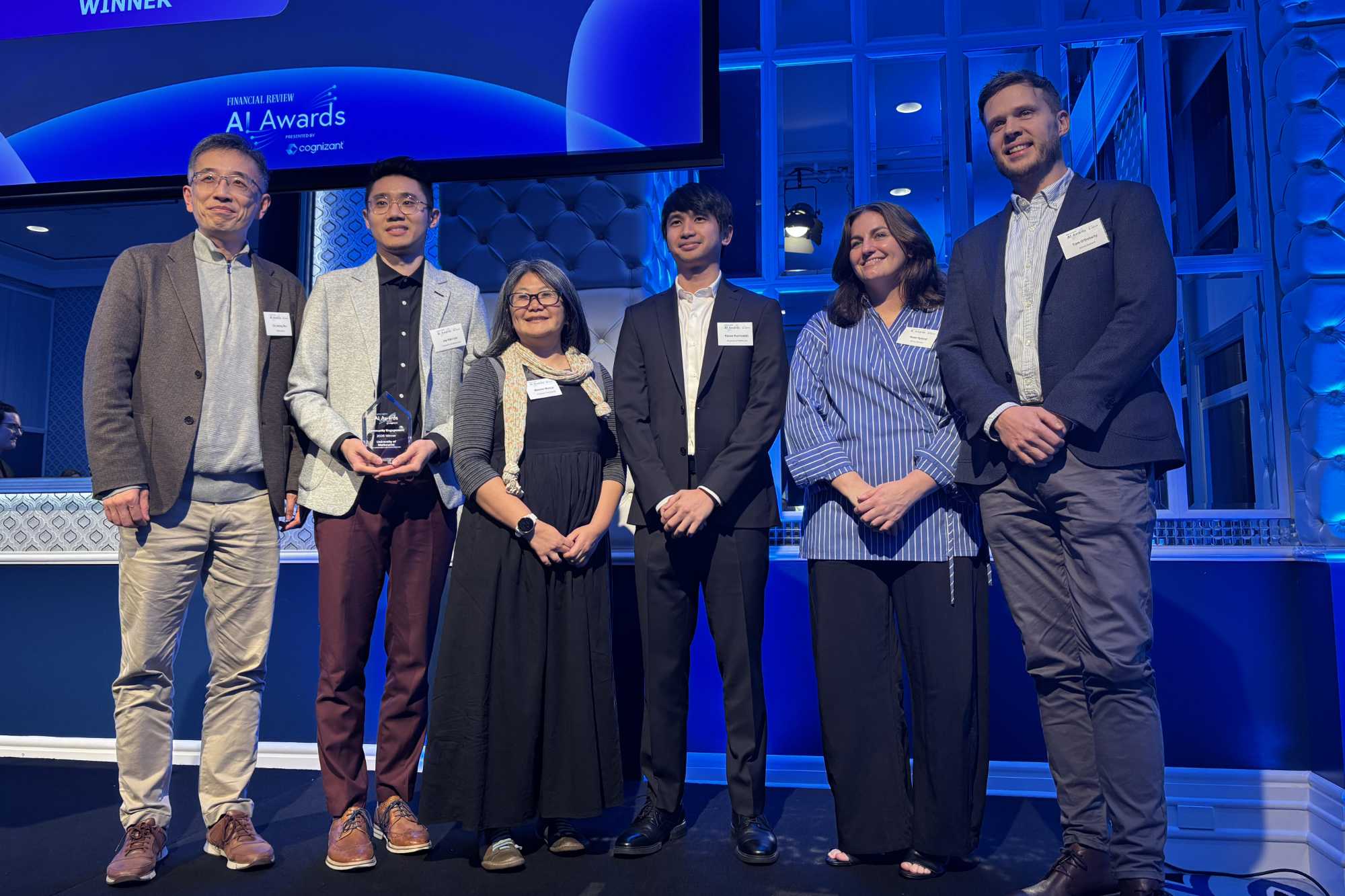 L-R: Dr Liming Zhu (AFR AI Awards Judge), Associate Professor Jey Han Lau, Dr Mel Mistica, Dr Kemal Kurniawan, Rose Hyland (Senior Project Lead, Justice Connect) and Tom O'Doherty (Head of Innovation and Connections, Justice Connect).